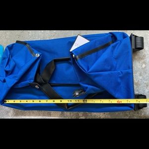 Onboard travelers bag with wheels